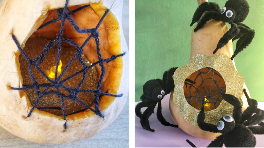 Halloween-Dekokürbis mit Spinnennetz und Spinnen